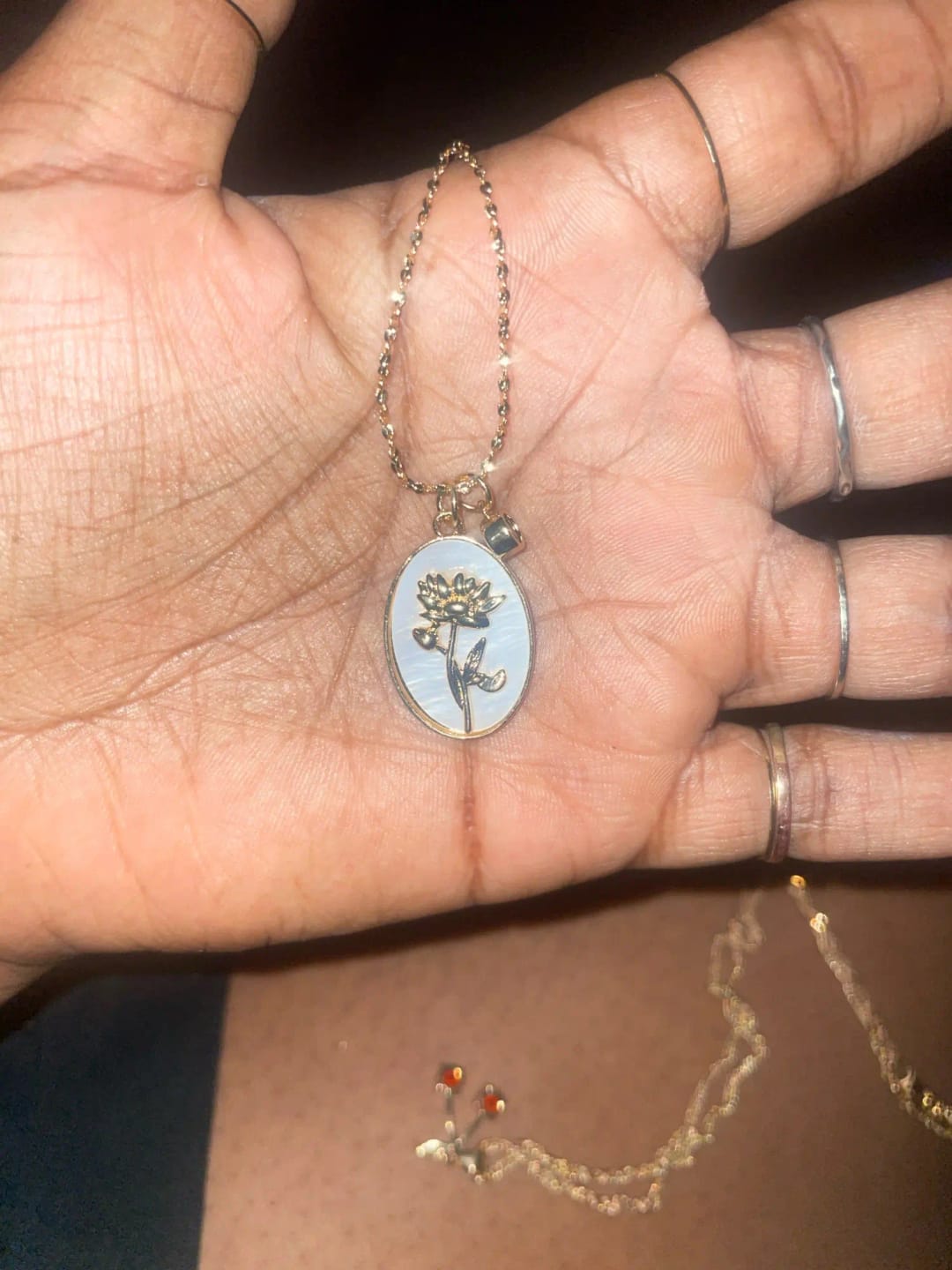 Customer photo review of Birth Flower Necklace with Birthstone '18k Gold Plated'