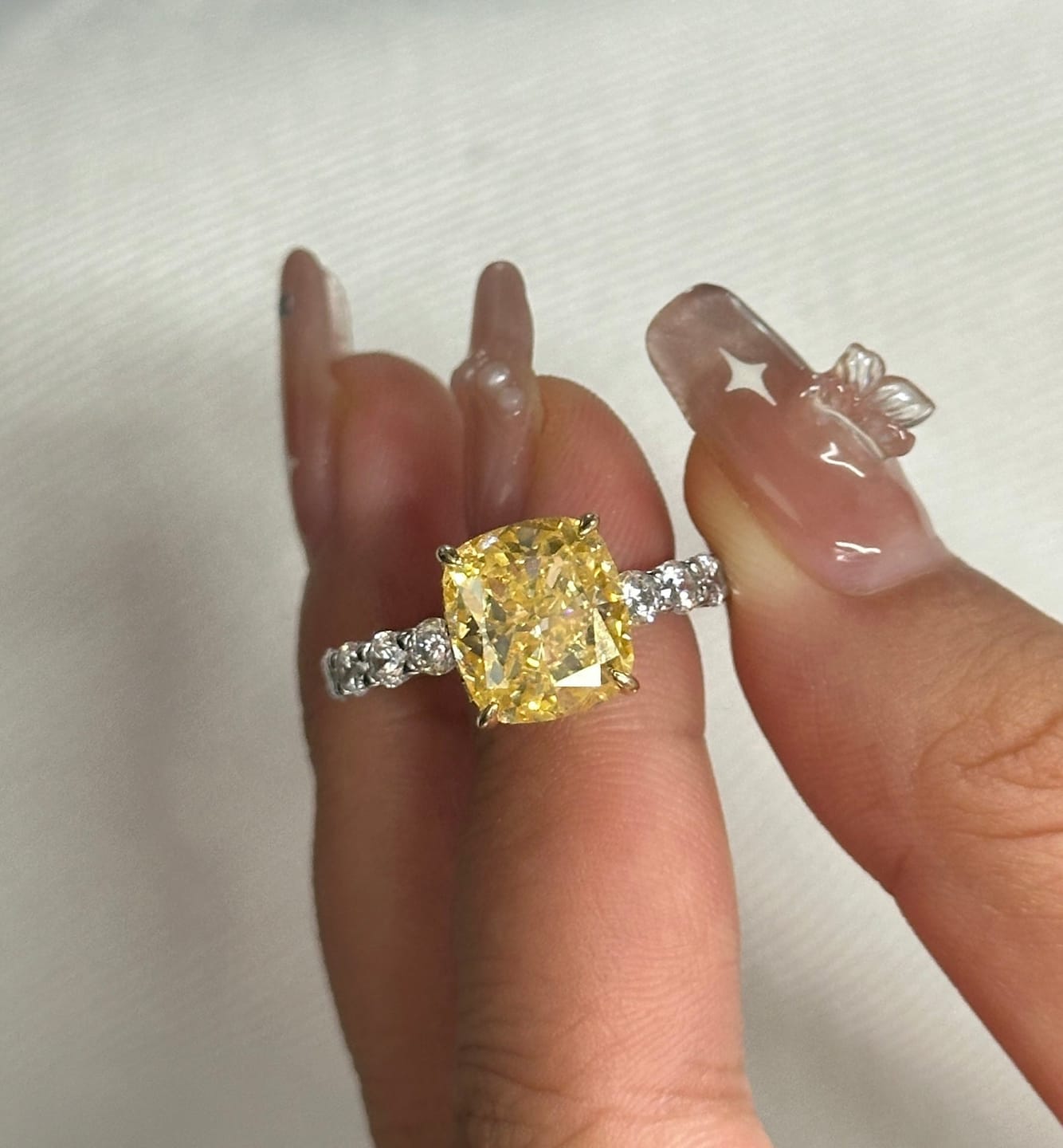 Customer photo review of Louily Stunning Two-tone Cushion Cut Yellow Sapphire Engagement Ring