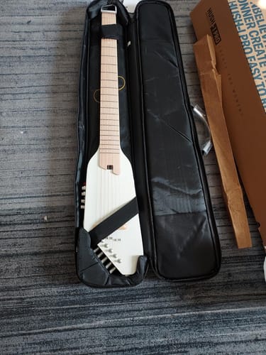 Customer photo review of Donner HUSH-I PRO Acoustic-Electric Travel Guitar Kit with Inserted Sound Effects