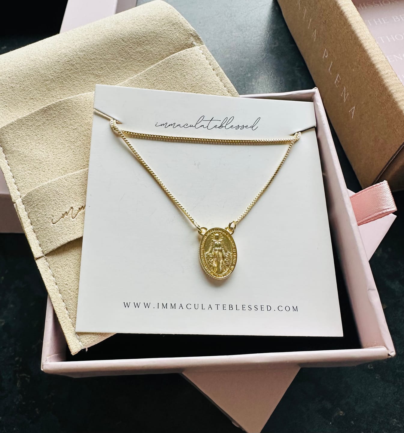 Customer photo review of Miraculous Medal x Our Lady of Sorrow Gold Filled Dainty Chain Necklace