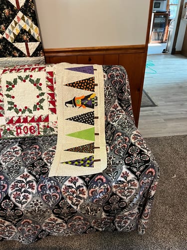 Customer photo review of Santa in the Trees Table Runner Pattern