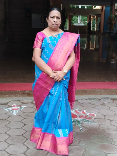 Customer photo review of Teal Printed Dola Silk Saree With Jacquard Border