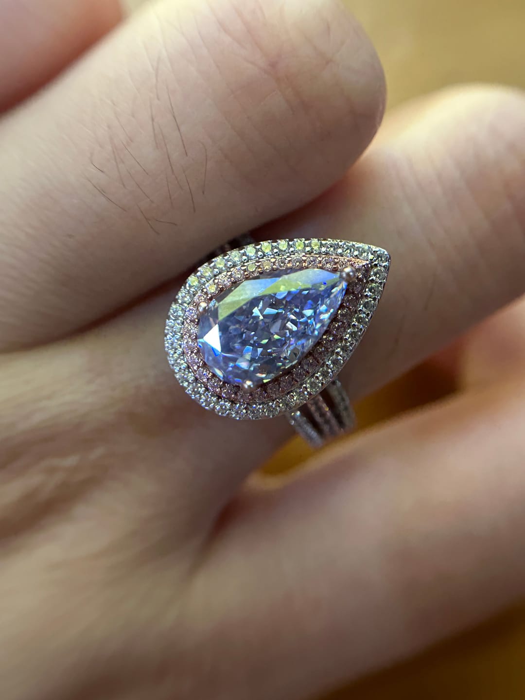 Customer photo review of Louily Luxurious Double Halo Pear Cut Aquamarine Blue/Purple Engagement Ring In Sterling Silver