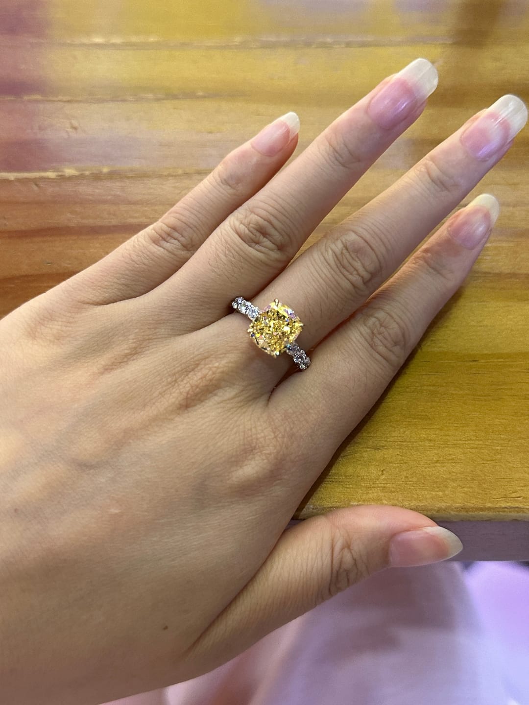 Customer photo review of Louily Stunning Two-tone Cushion Cut Yellow Sapphire Engagement Ring