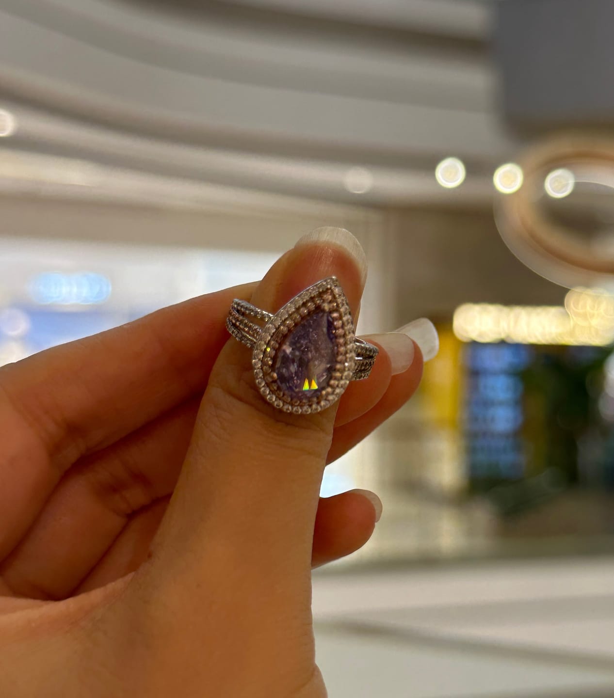 Customer photo review of Louily Luxurious Double Halo Pear Cut Aquamarine Blue/Purple Engagement Ring In Sterling Silver