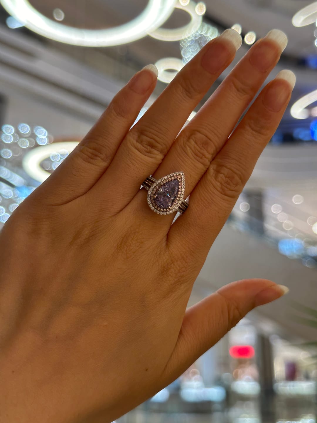 Customer photo review of Louily Luxurious Double Halo Pear Cut Aquamarine Blue/Purple Engagement Ring In Sterling Silver