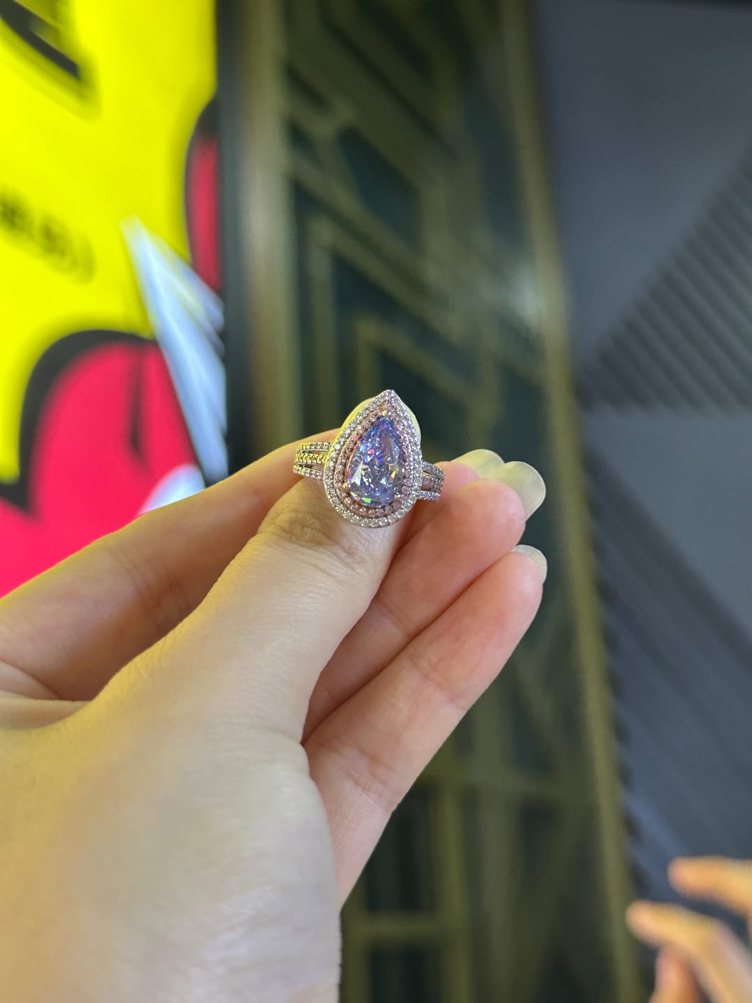 Customer photo review of Louily Luxurious Double Halo Pear Cut Aquamarine Blue/Purple Engagement Ring In Sterling Silver