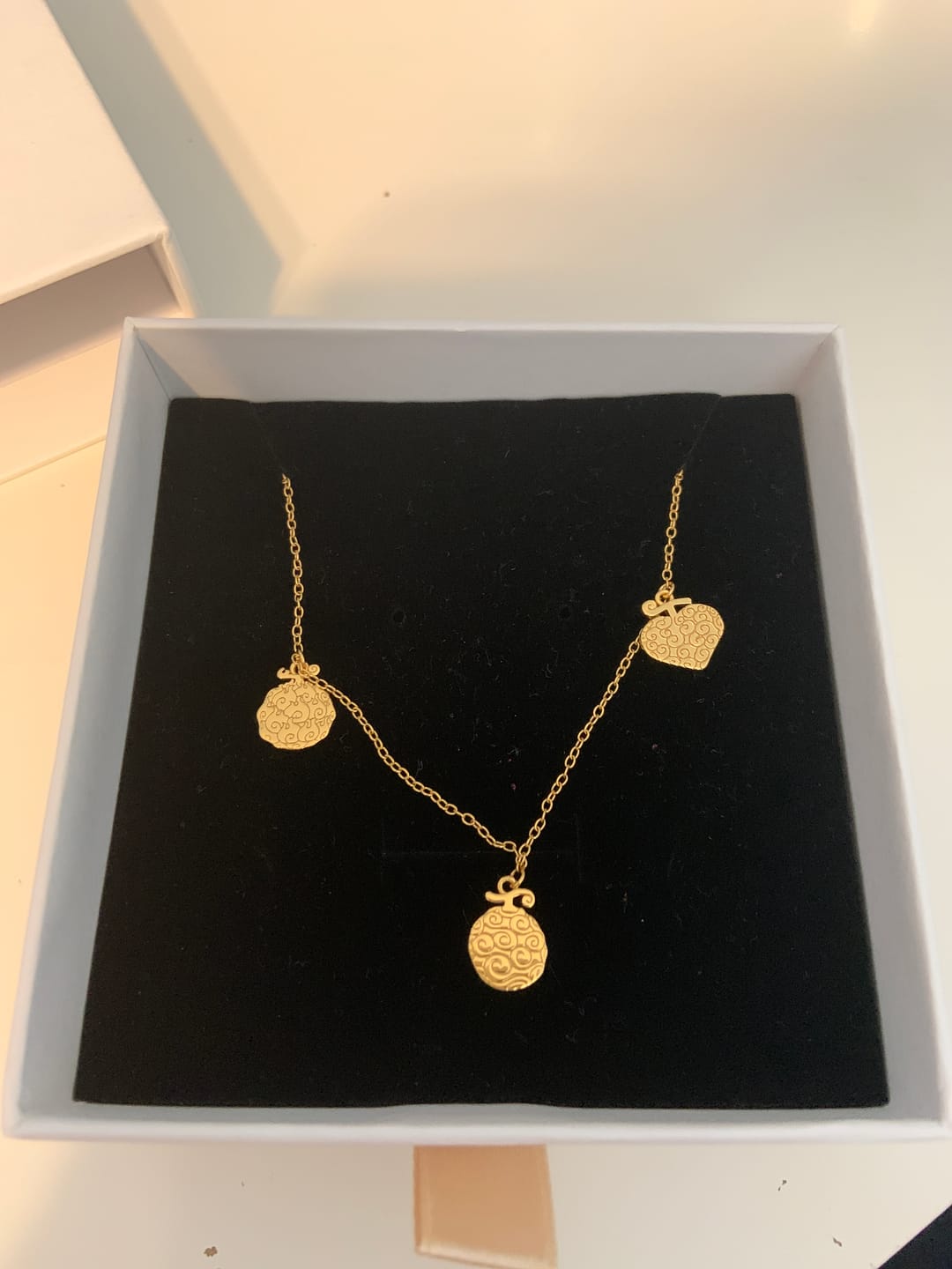 Customer photo review of Devil Fruit Necklace