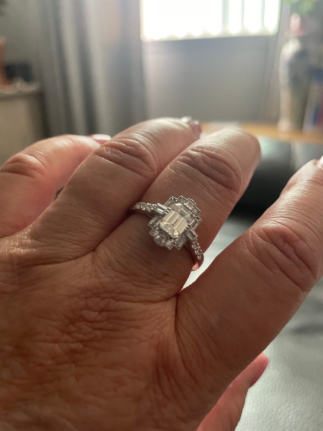 Customer photo review of Art Deco Emerald Cut Moissanite Milgrain Engagement Ring