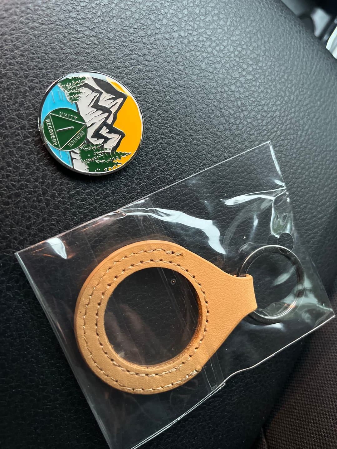 Customer photo review of Sobriety Mint Genuine Leather 34mm AA Medallion Keychain Holder - Recovery Chip/Coin/Token Holder - Tan