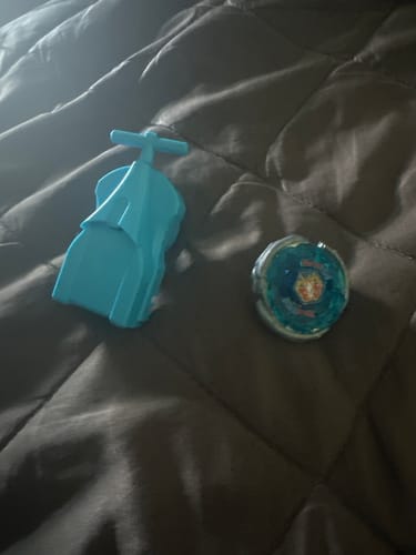 Customer photo review of Takara Tomy Storm Pegasus Beyblade BB-28 105RF Metal Fusion - With String Launcher