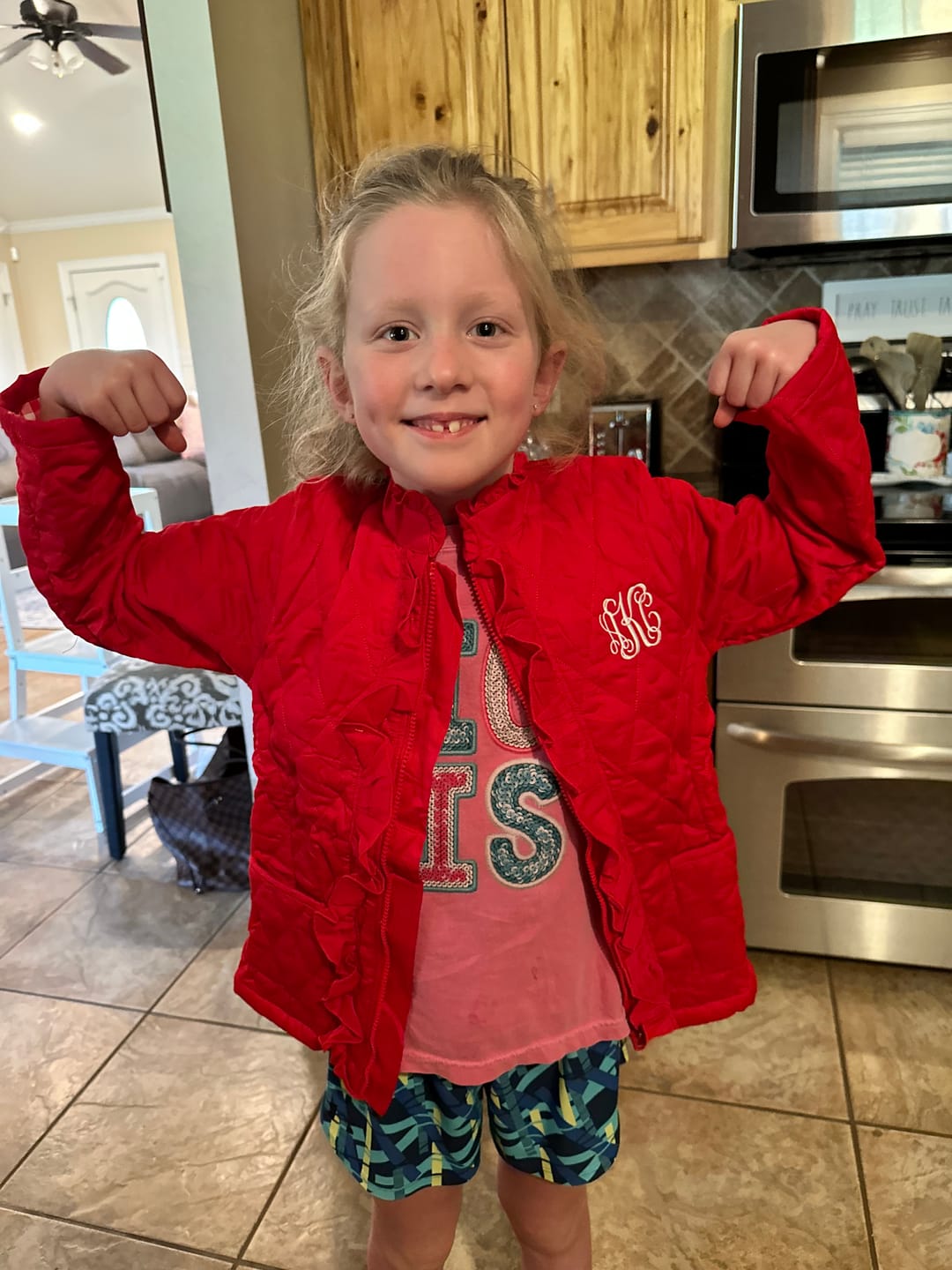 Customer photo review of Red Quilted Ruffle Coat