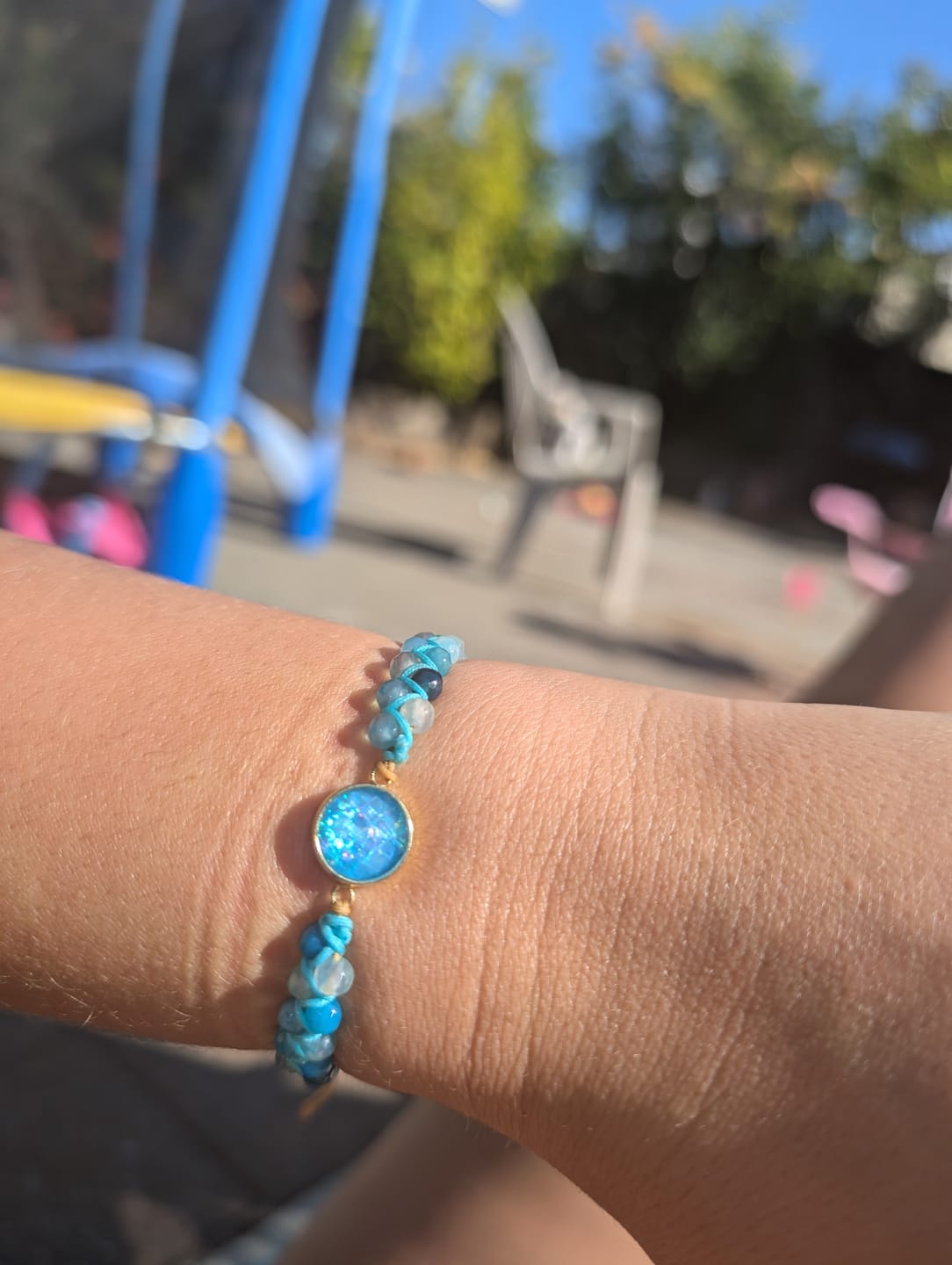 Customer photo review of Aqua Pura Opal Protection Bracelet