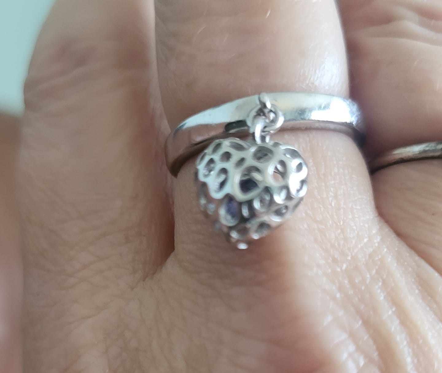 Customer photo review of Angel Heart Charm Ring with Tanzanite