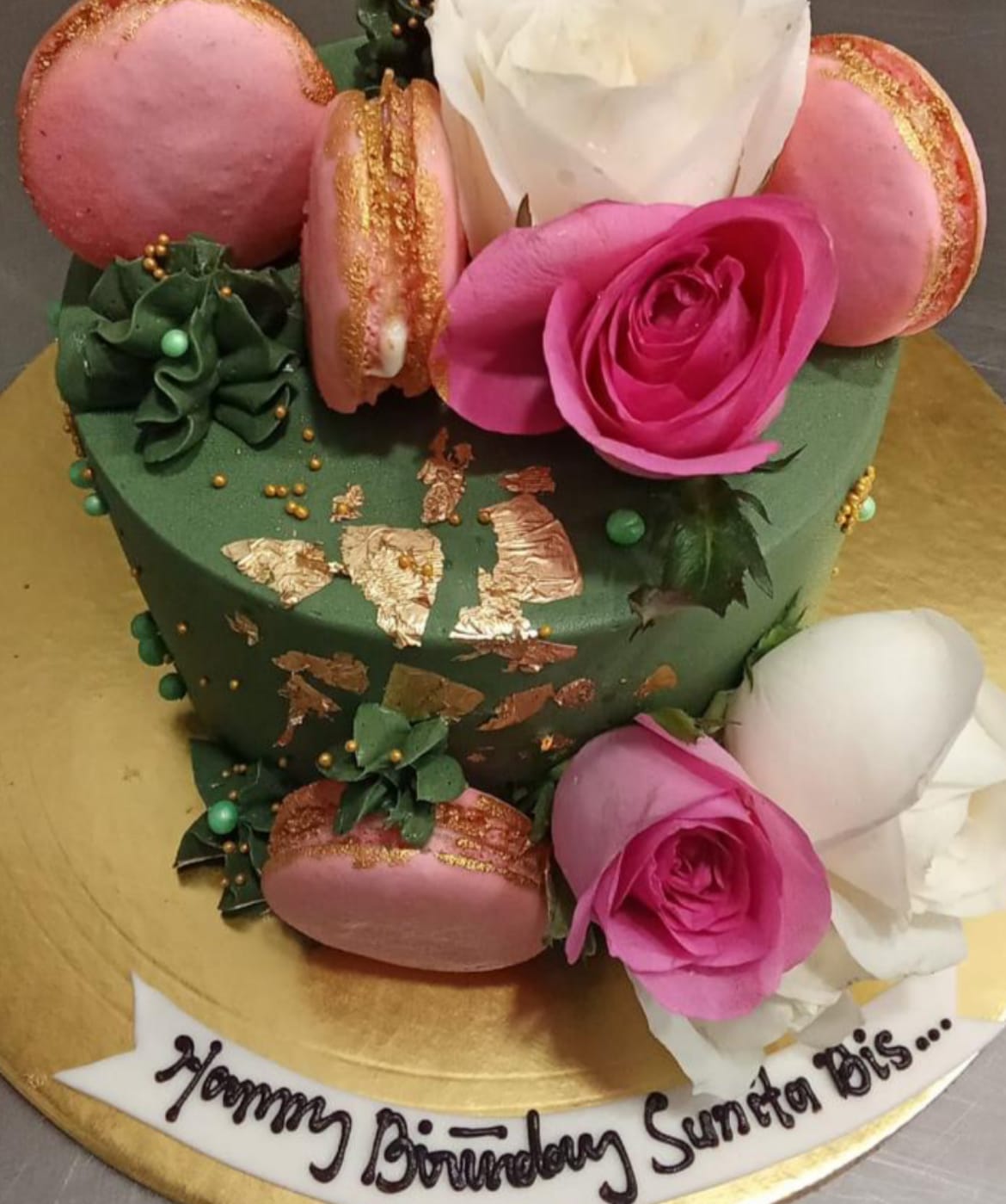 Customer photo review of Bottle Green Floral Cake