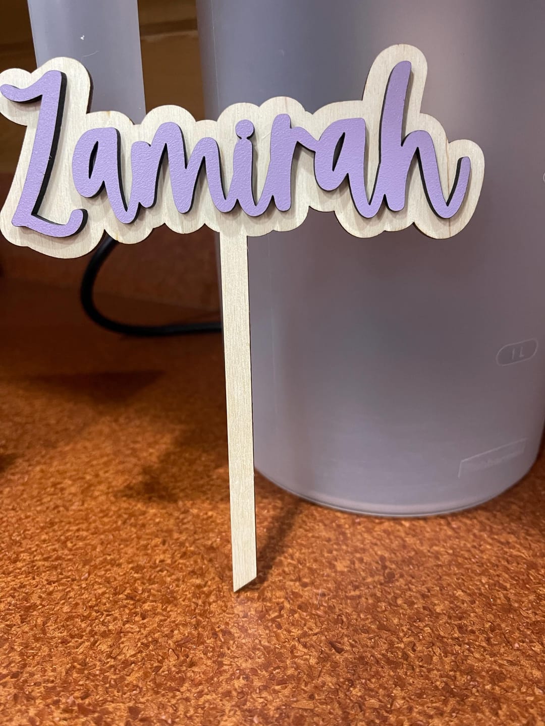 Customer photo review of Name Cake Topper