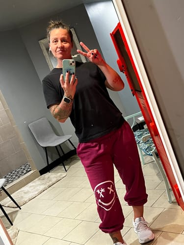 Customer photo review of Salty Savage Ladies “Spliced Smile” Fleece Cargo Sweatpants | Magenta