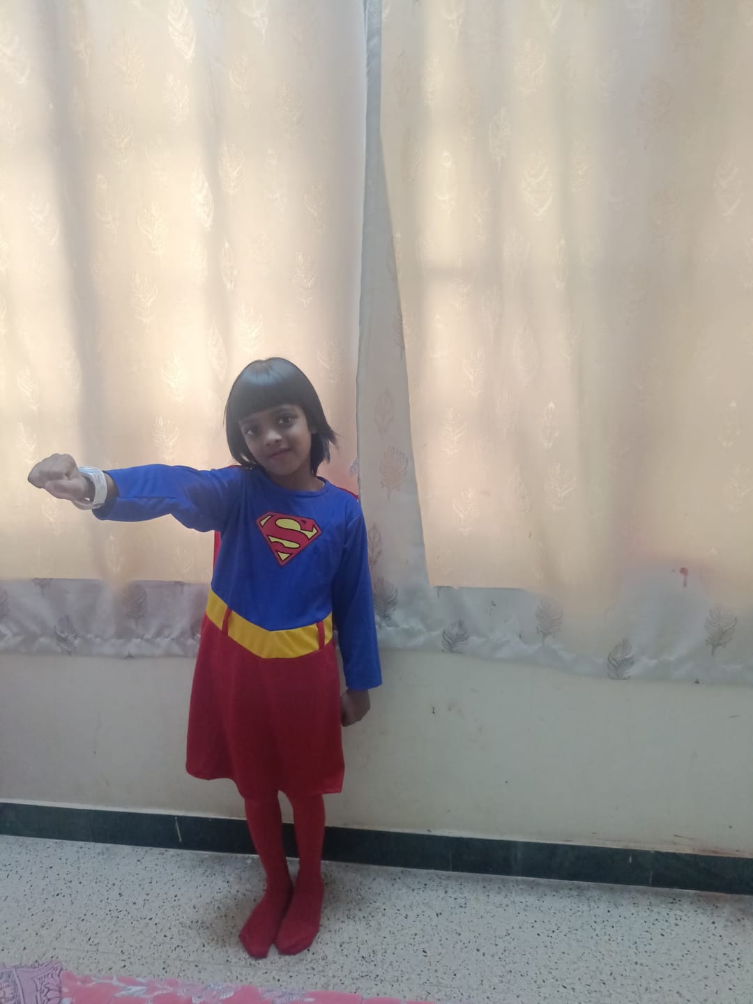 Customer photo review of Supergirl Dress with Cape and Stocking