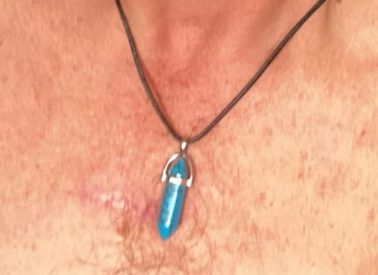 Customer photo review of 19 Design Natural Crystal Pendant Black Leather Necklaces