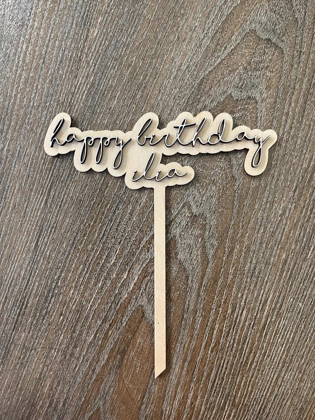 Customer photo review of Name Cake Topper