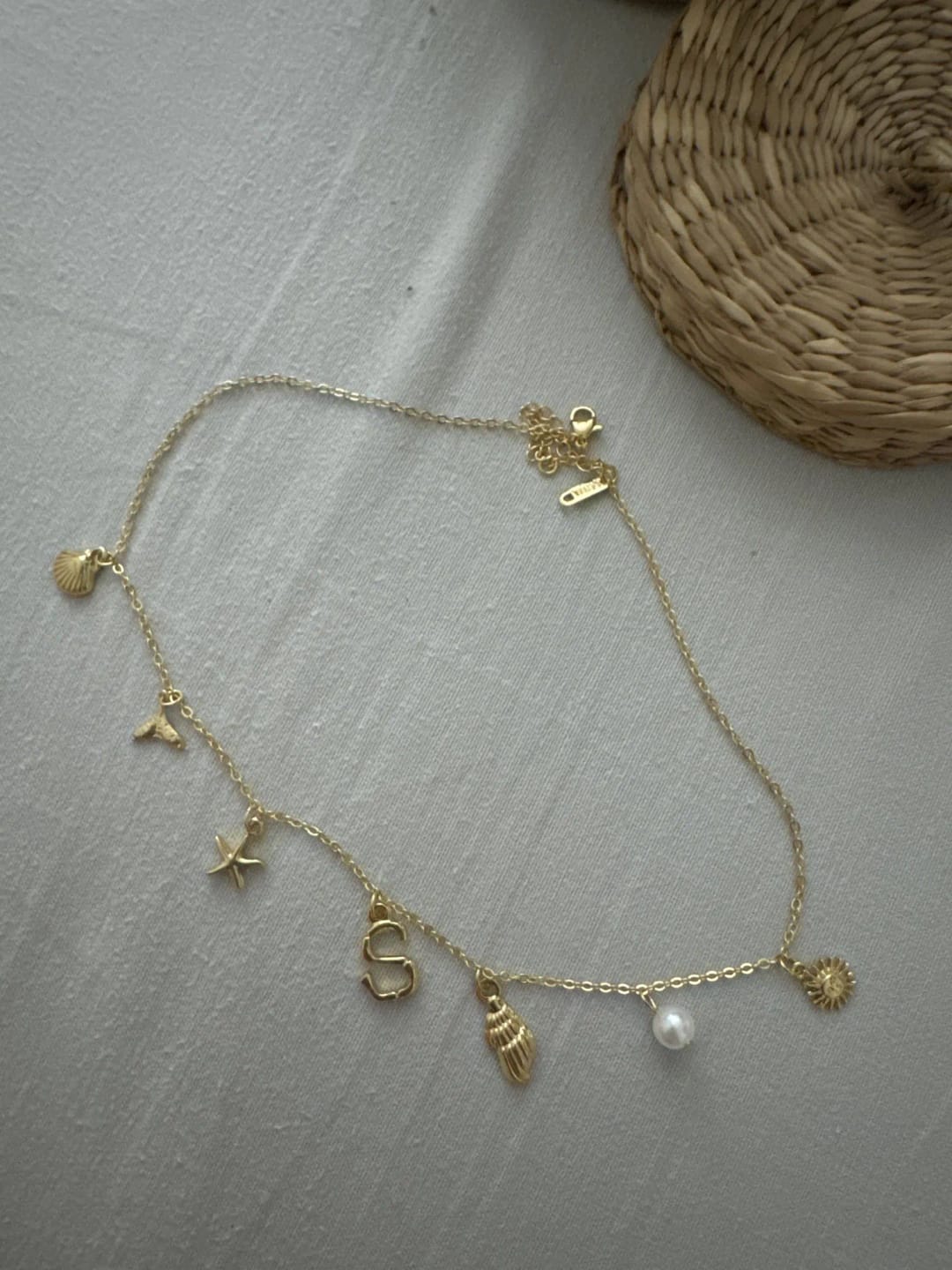 Customer photo review of Ocean Dreams Initial Necklace '18k Gold Plated'