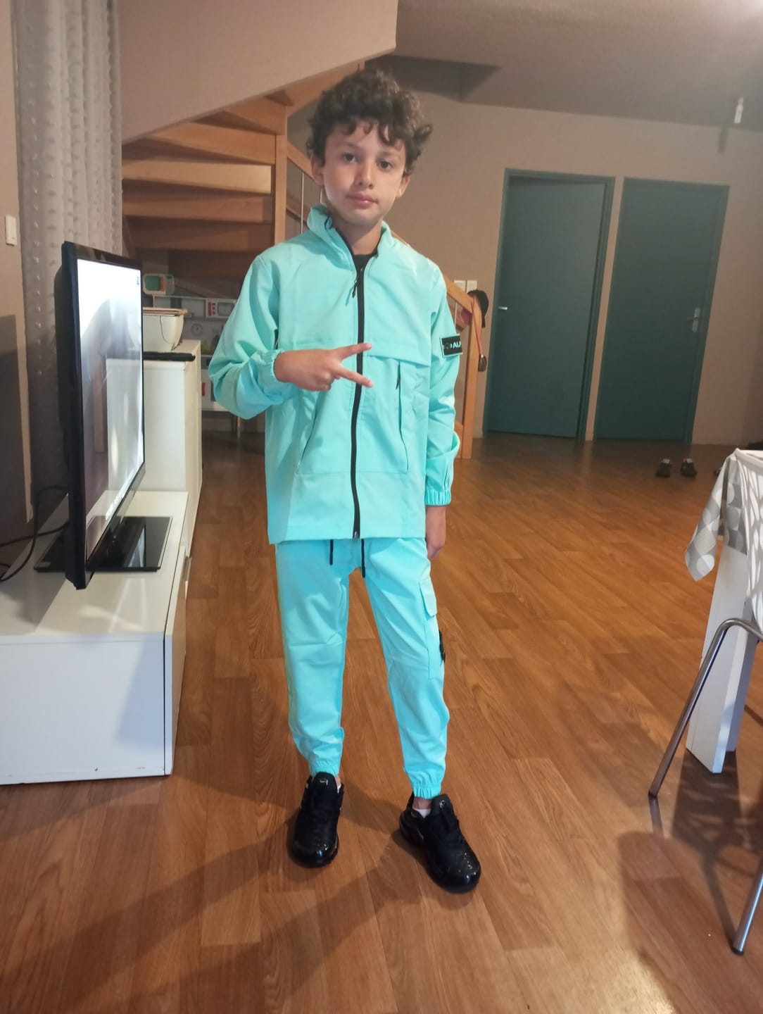 Customer photo review of SURVÊTEMENT ALPHA ENFANT VESTE ET PANTALON - TURQUOISE