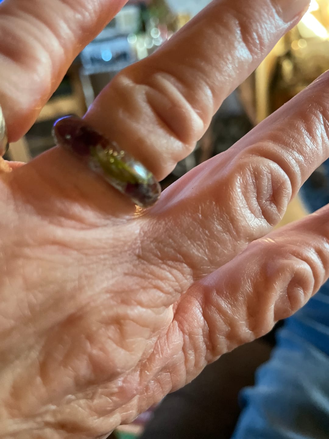 Customer photo review of Red Rose Moss Ring with Cremation Ash and Gold Flakes