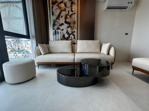 Customer photo review of ASTON - Bàn trà inox xoay 360 độ, mặt kính cường lực