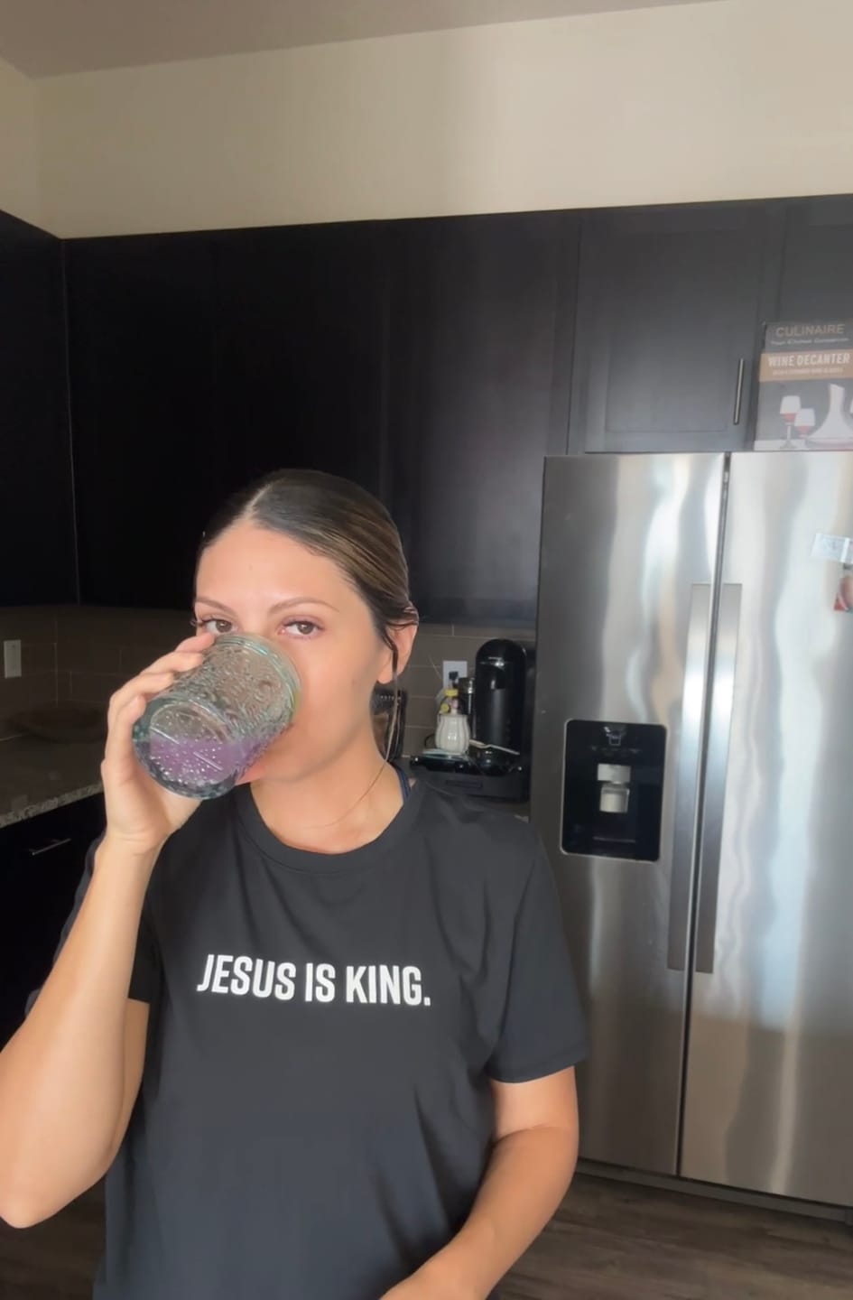Customer photo review of Women's Jesus Is King Performance Tee