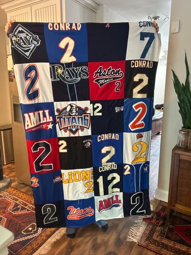 T-shirt quilt featuring titans, lions by Carly from PA