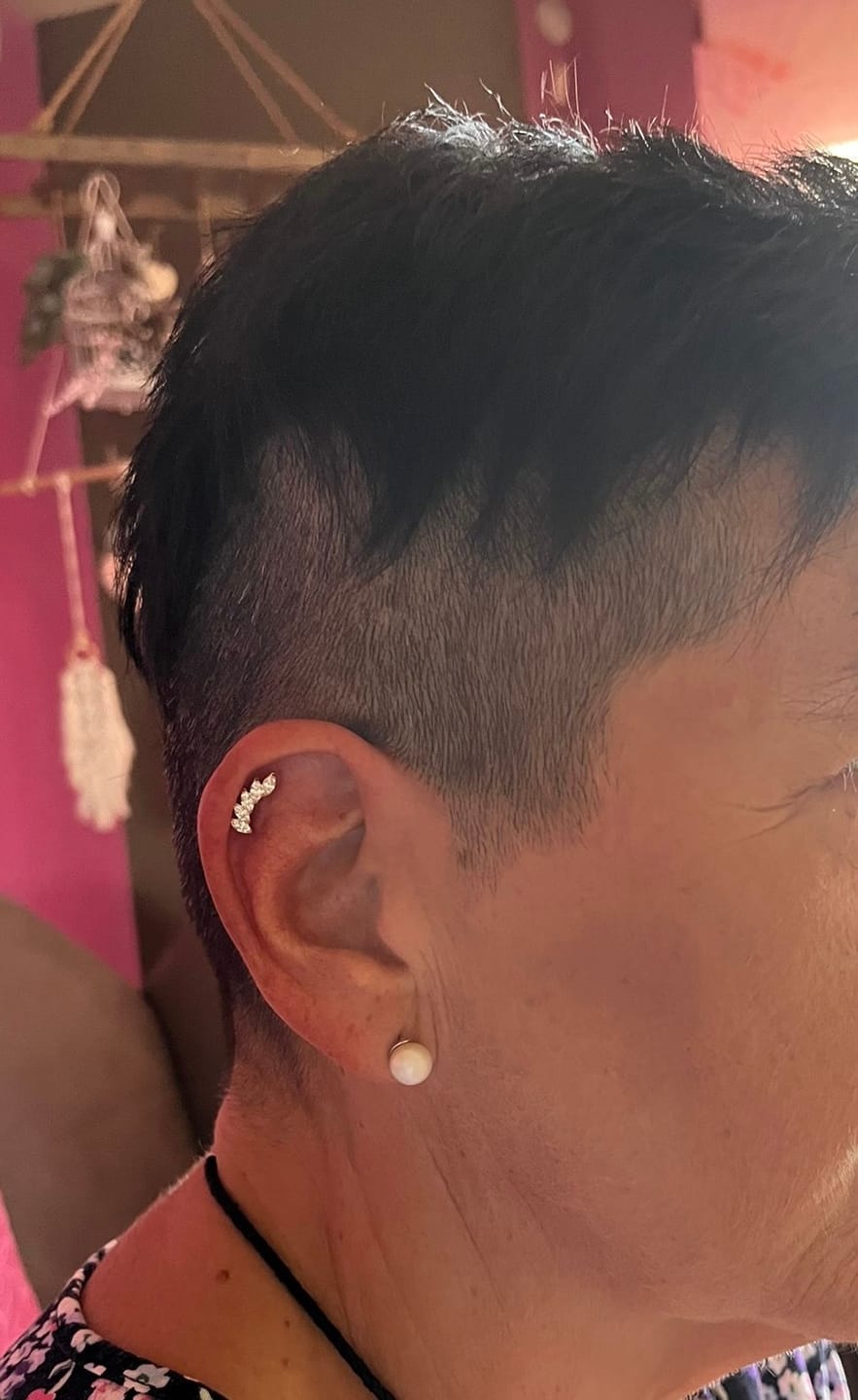 Customer photo review of Feather Piercing | Titan