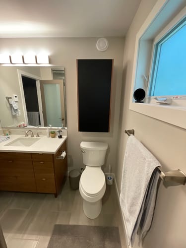 Customer photo review of Sidney Matte Black Wall Cabinet