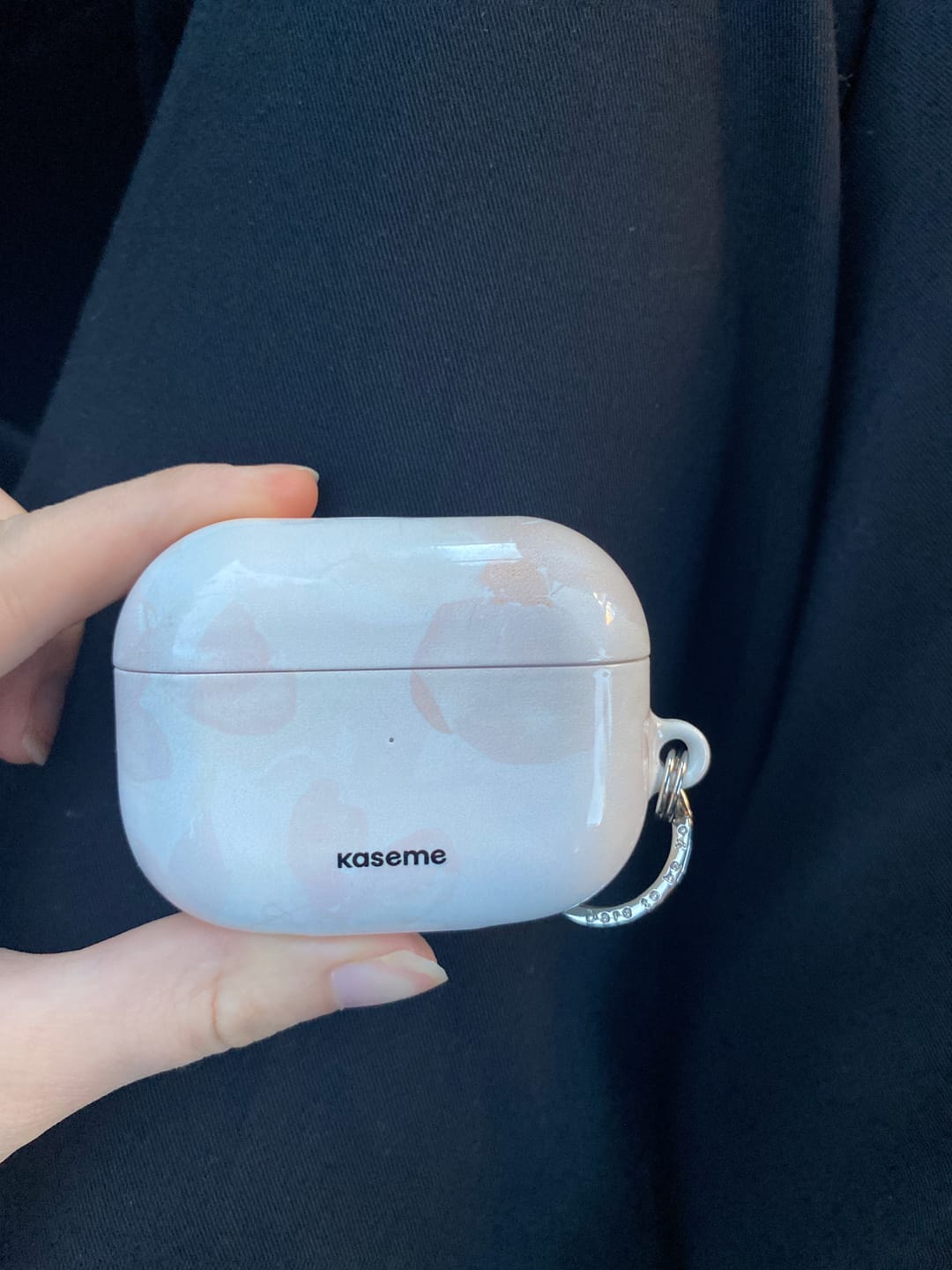 Customer photo review of Longchamp AirPods case