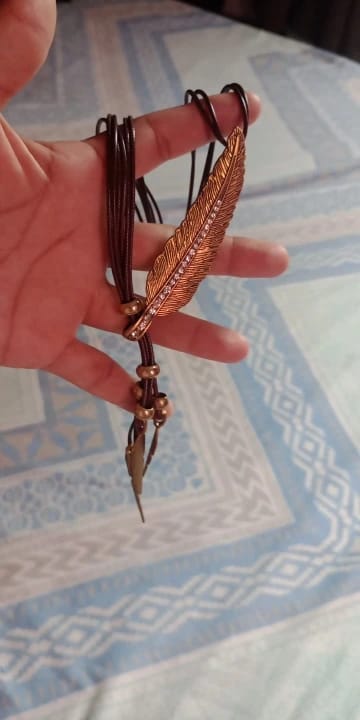 Customer photo review of Feather Leather Pendant Necklace