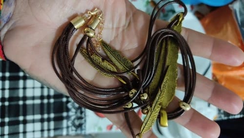 Customer photo review of Feather Leather Pendant Necklace