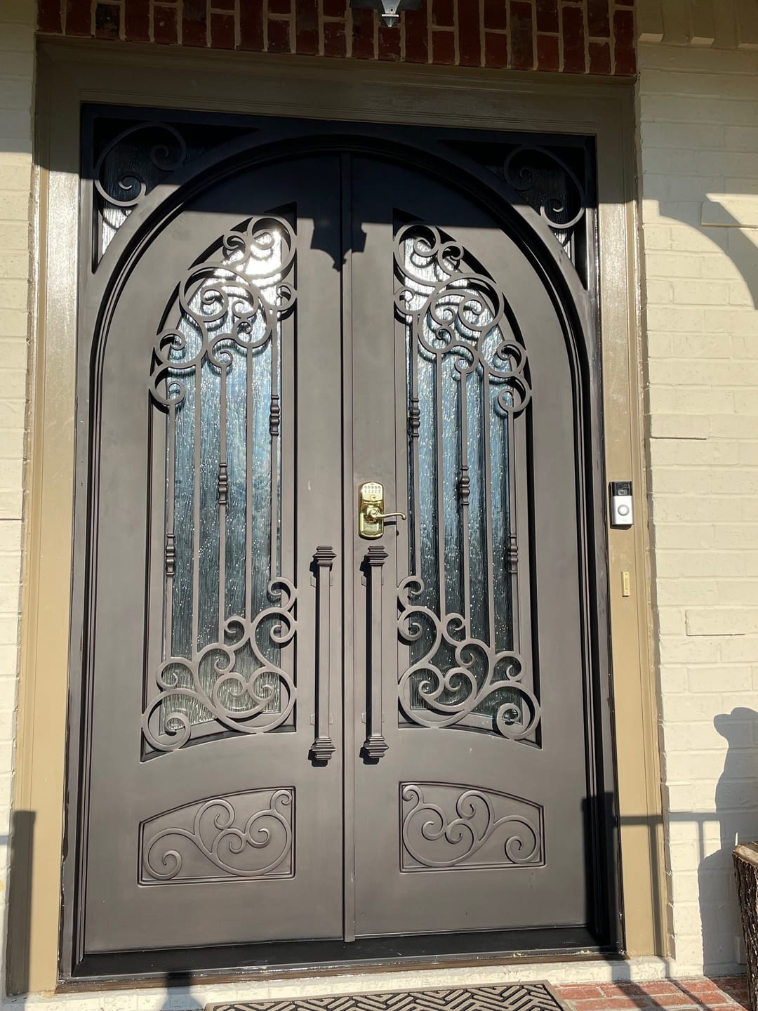 Customer photo review of Conroe Model Double Front Entry Iron Door With Tempered Rain Glass Dark Bronze Finish