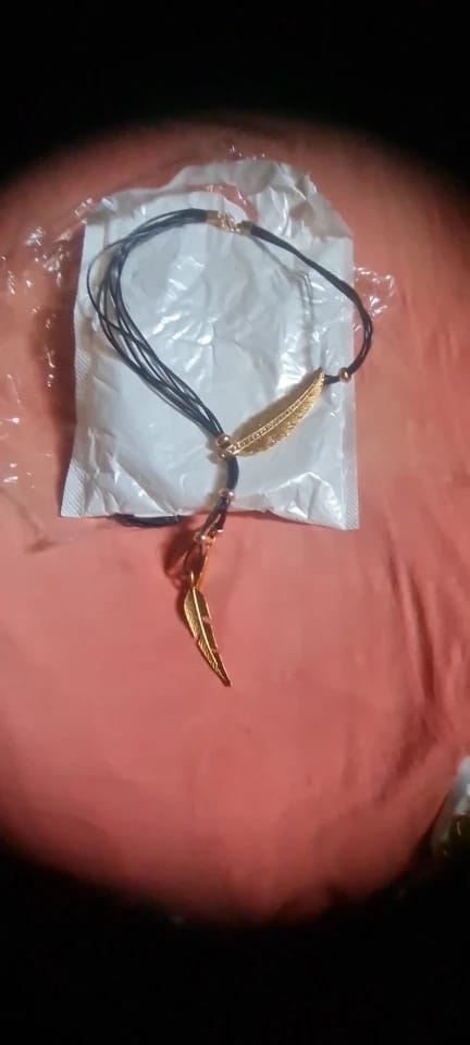 Customer photo review of Feather Leather Pendant Necklace