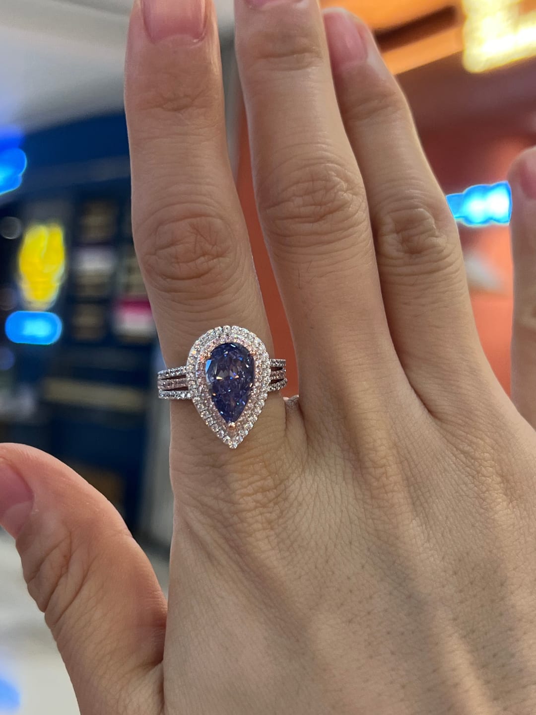 Customer photo review of Louily Luxurious Double Halo Pear Cut Aquamarine Blue/Purple Engagement Ring In Sterling Silver