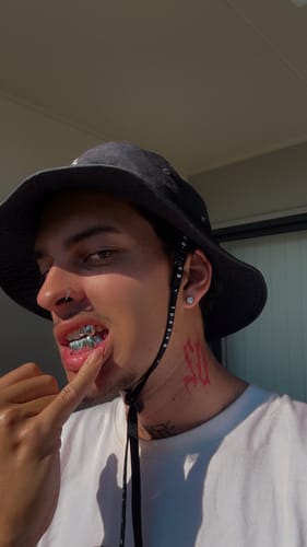Customer photo review of 8 PIECE SILVER GRILLZ SALE