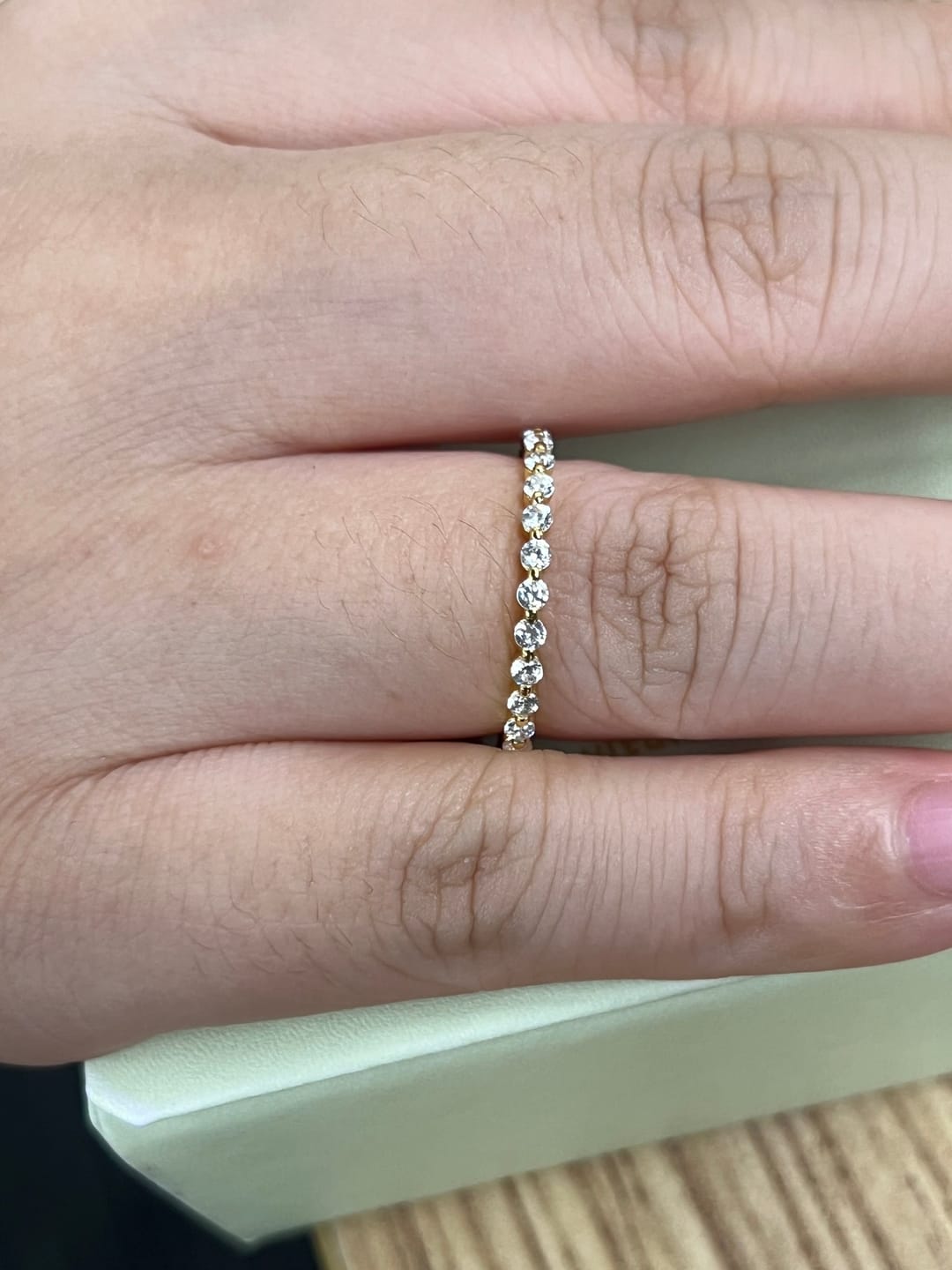 Customer photo review of Louily Classic Round Cut Full Eternity Wedding Band In Sterling Silver