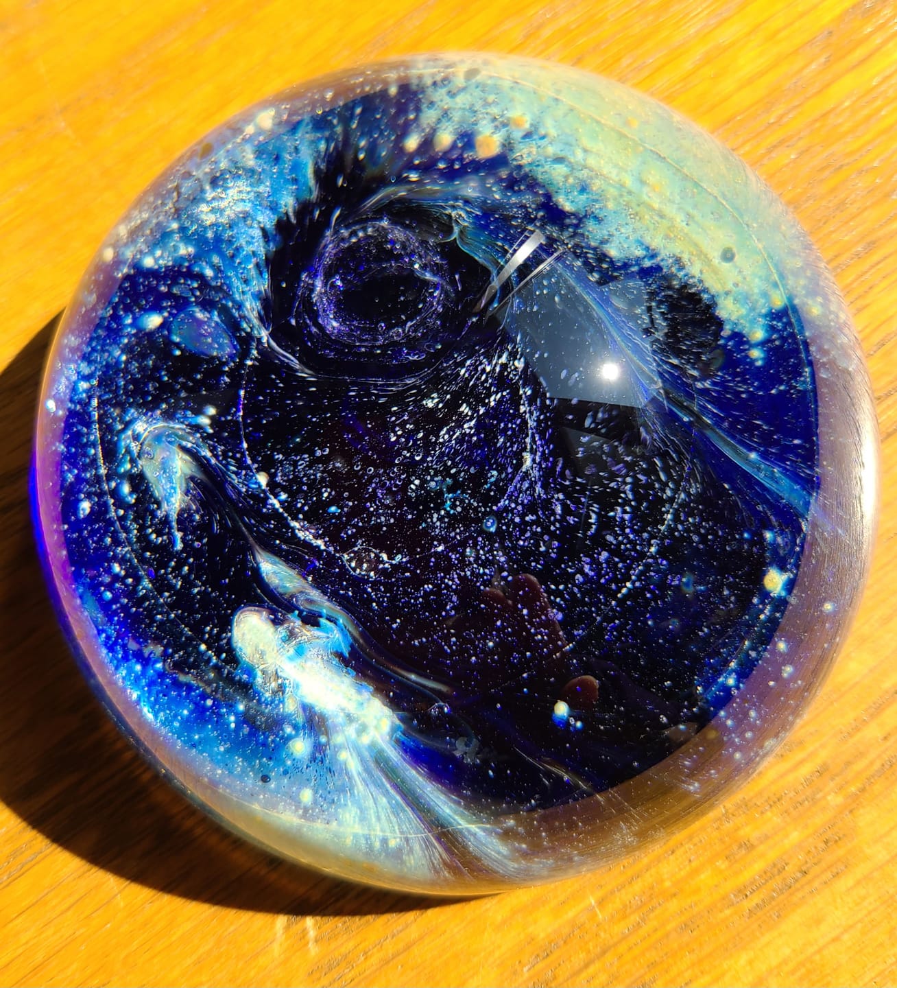 Customer photo review of Nightswirl Paperweight with Infused Cremation Ash