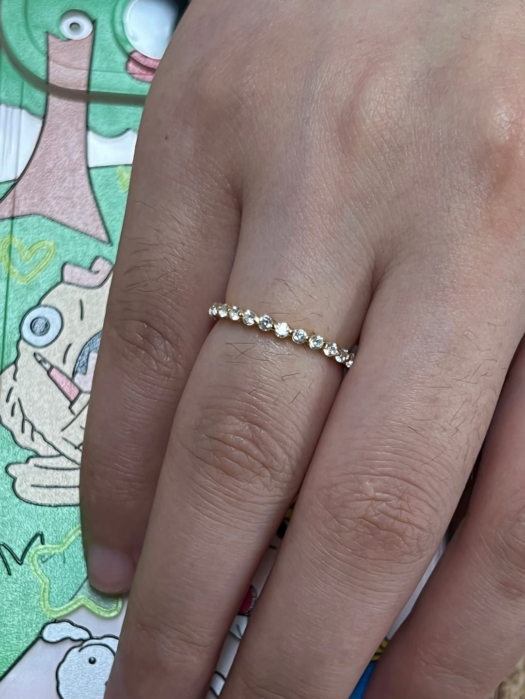 Customer photo review of Louily Classic Round Cut Full Eternity Wedding Band In Sterling Silver