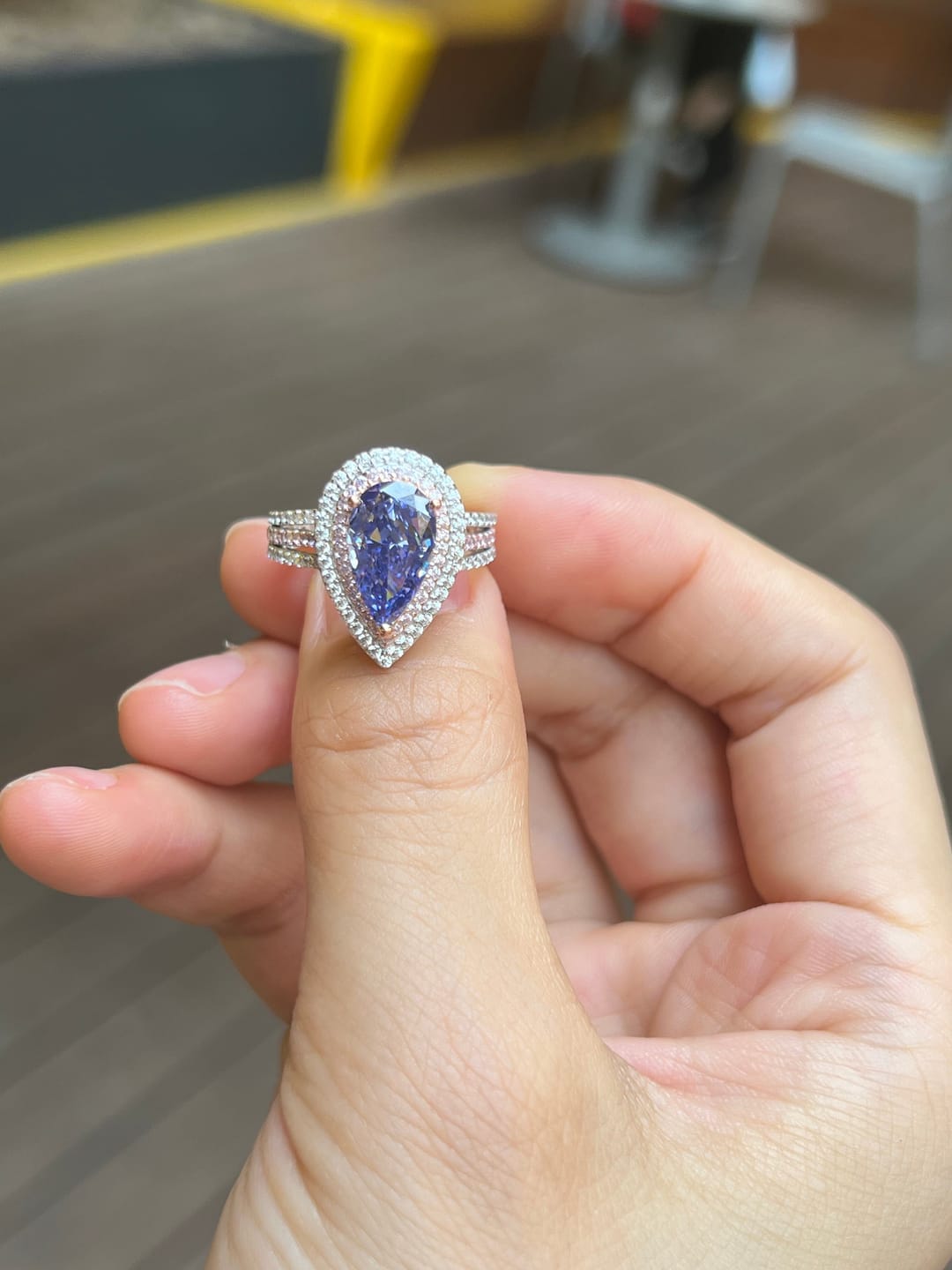 Customer photo review of Louily Luxurious Double Halo Pear Cut Aquamarine Blue/Purple Engagement Ring In Sterling Silver