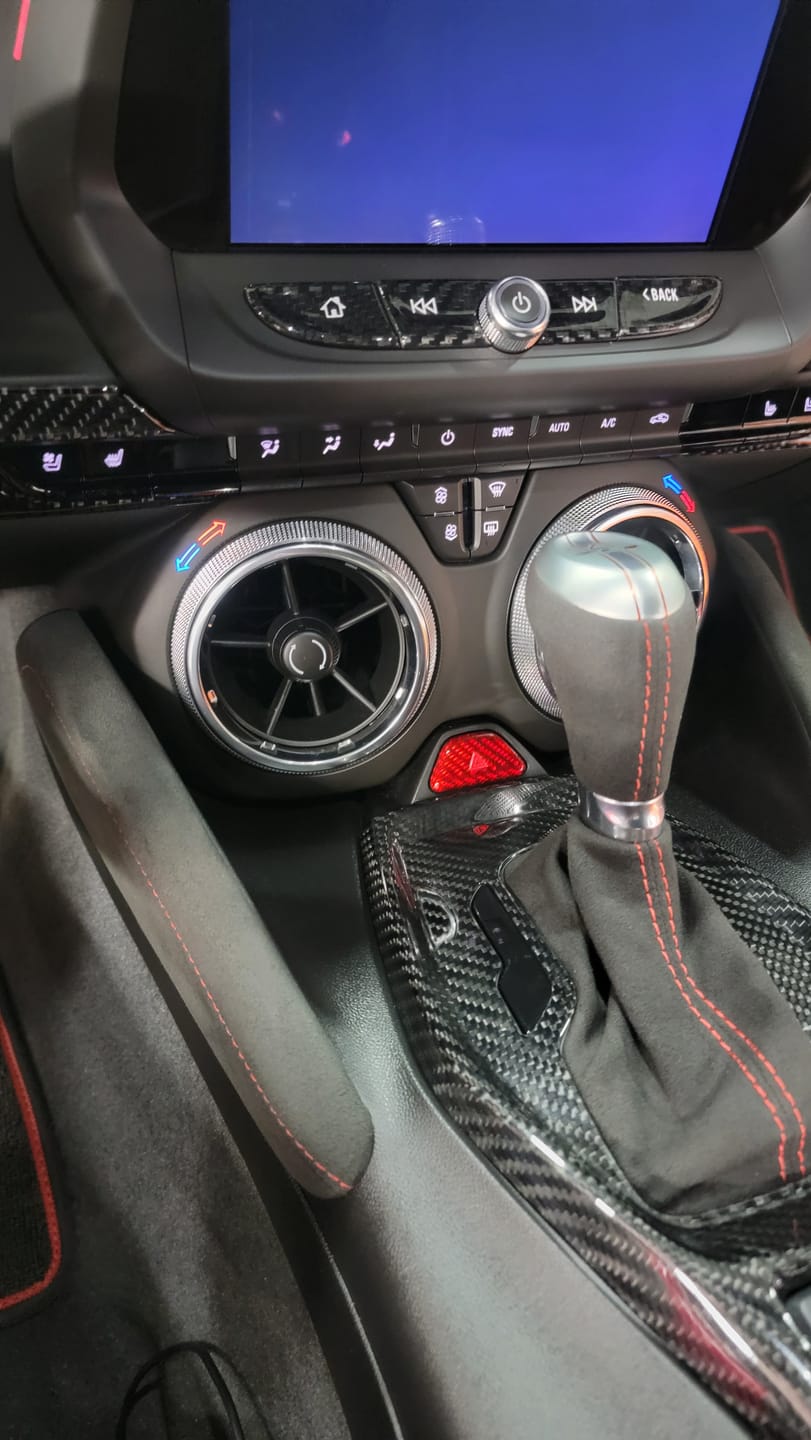 Customer photo review of 2016-2024 Chevy Camaro Real Carbon Fiber Interior Hazard Button Cover