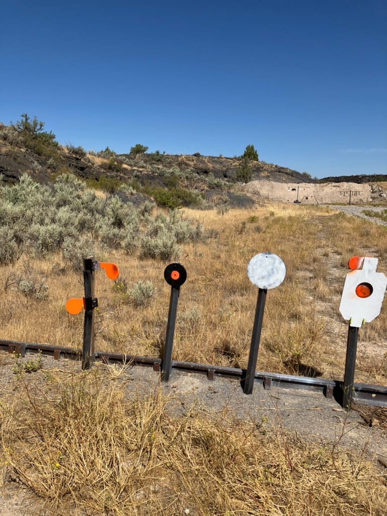 Customer photo review of AR500 Steel Hostage Target 12" x 20" x 1/2" Armored Steel Bullseye Reactive Target with 2X4 & T-Post Bracket