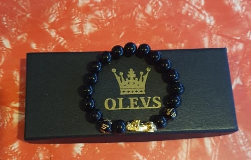 Customer photo review of Elegane® 9947 Men's Watches Top Brand Luxury Original Waterproof Quartz Watch for Man Gold Skeleton Style 24 Hour Day Night