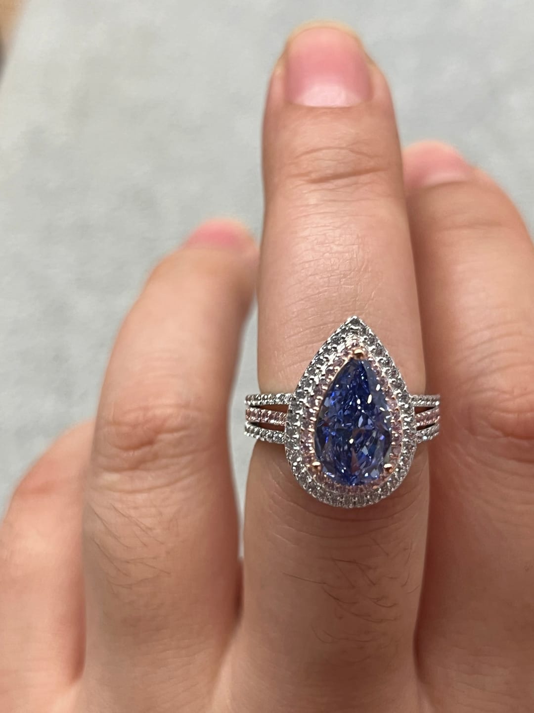 Customer photo review of Louily Luxurious Double Halo Pear Cut Aquamarine Blue/Purple Engagement Ring In Sterling Silver