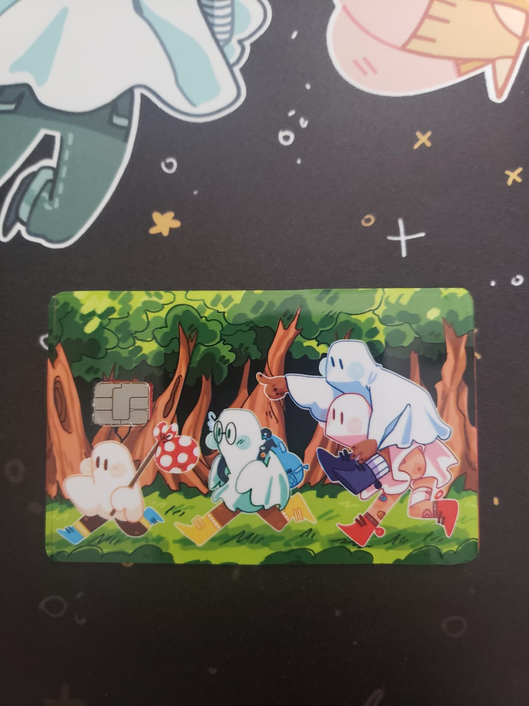 Customer photo review of Runaway Ghosts Credit Card Skins