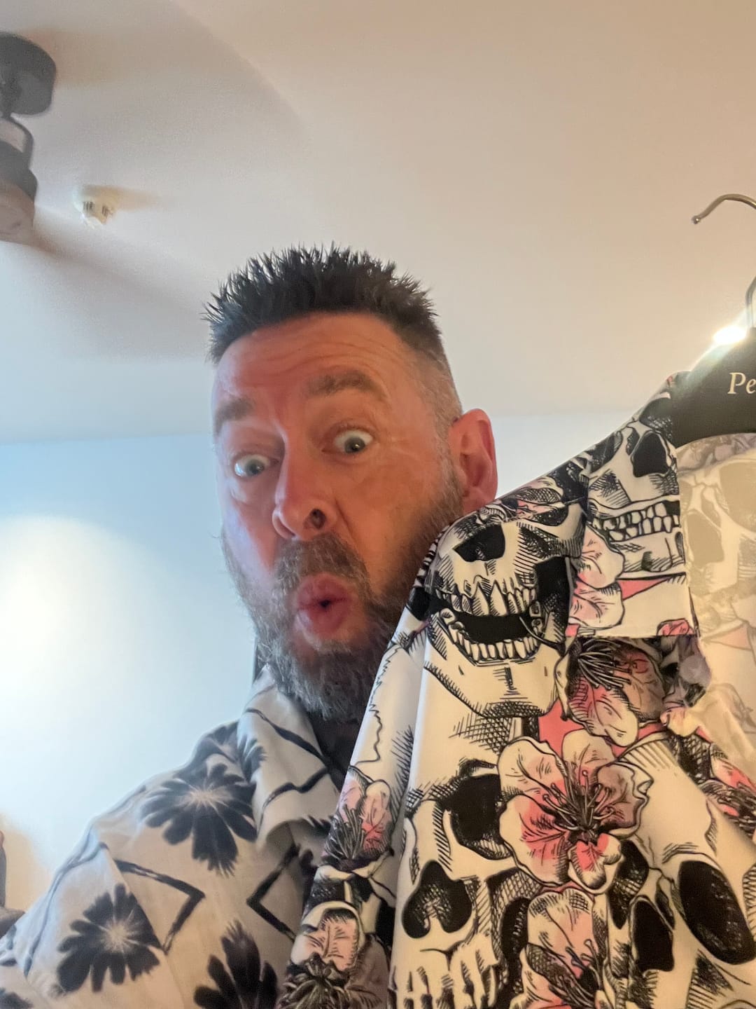 Customer photo review of Men's Skull Pink Flowers Button Up Short Sleeve Shirts