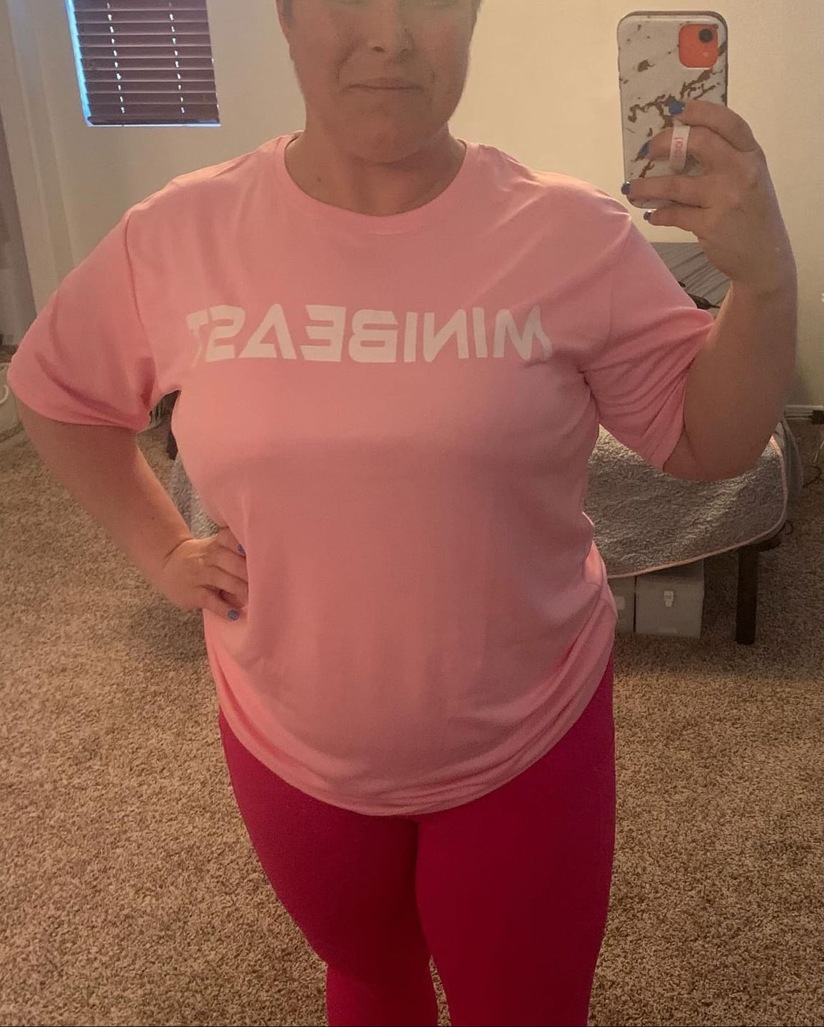 Customer photo review of "Girls Who Lift" Performance Unisex Tee
